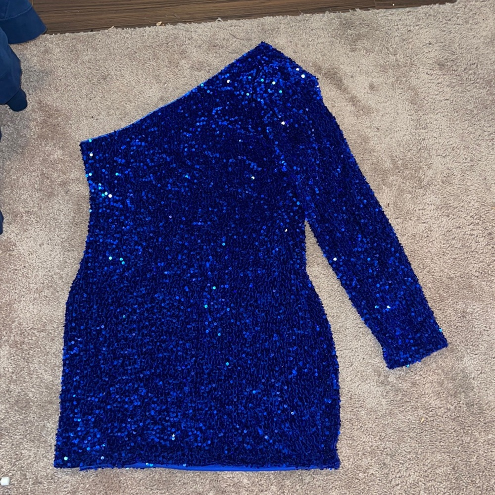 This is a Navy Blue One shoulder sparkly dress .